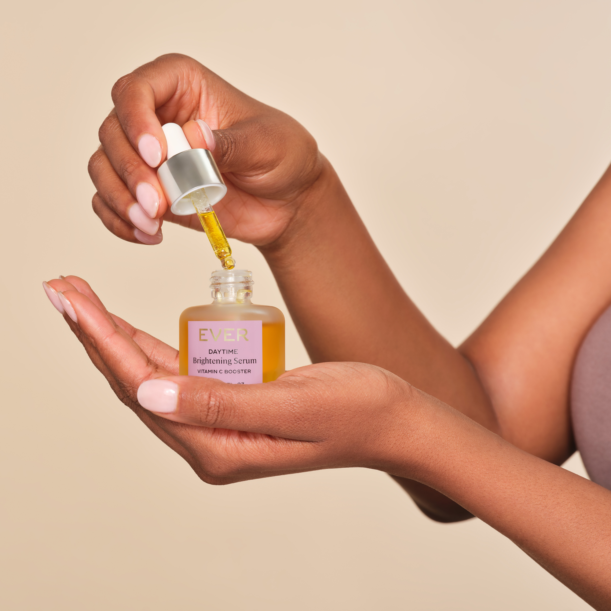 Woman using Brightening Eye Serum